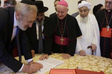Representatives_of_the_Abrahamic_religions_sign_a_declaration_on_end_of_life_issues_at_the_Vatican_Oct_28_2019_Credit_Vatican_Media.jpeg