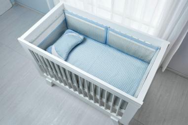 Empty-crib-blue-scaled-e1726685584734-810x500.jpg