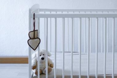 Empty-crib-scaled-e1776432560171.jpg