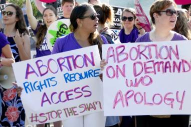 abortion_activists_1-810x500.jpg