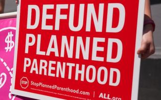 Defund_Planned_Parenthood_red_sign-e1721335206209-810x500.jpg