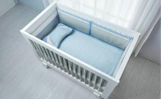 Empty-crib-blue-scaled-e1726685584734-810x500.jpg