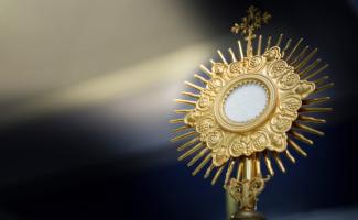 Eucharistic-adoration-e1750171095602.jpg